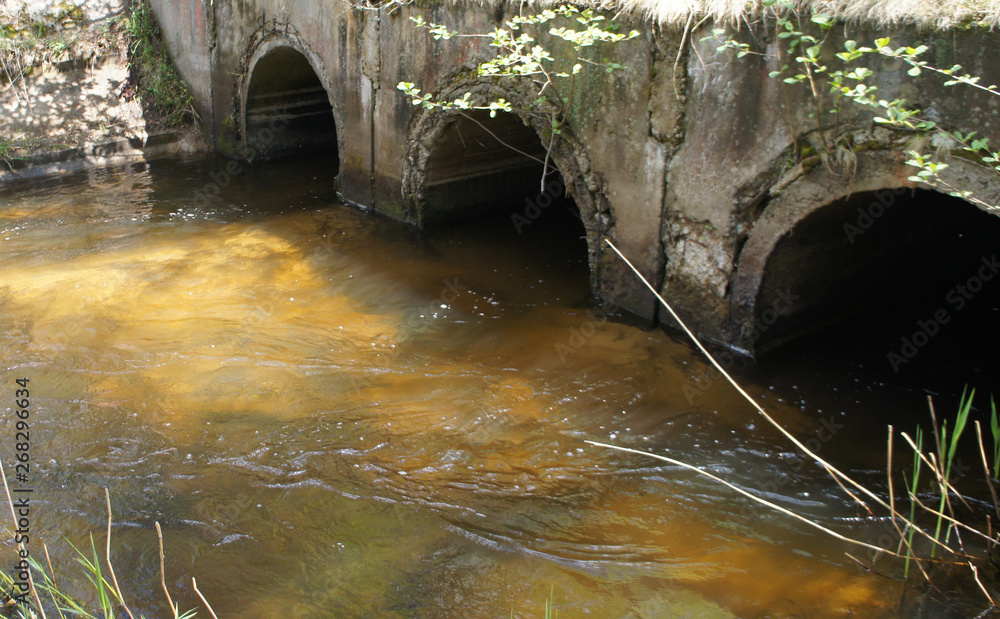 Old abandoned concrete bridge aqueduct in the forest. Old abandoned concrete bridge aqueduct in the forest.