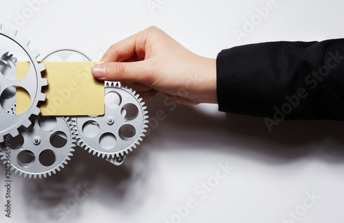 Business image using hand and card.