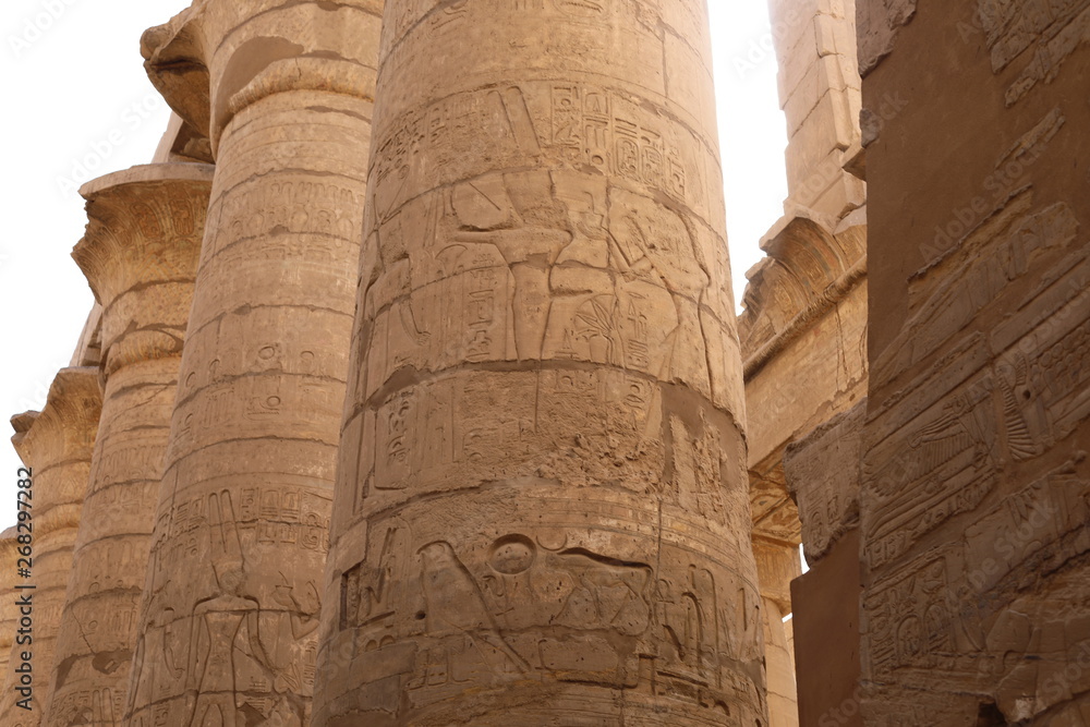 View of the column with ancient hieroglyphics at the Karnak Temple in Luxor, Egypt. Travel to the African continent for look of a UNESCO World Heritage Site.