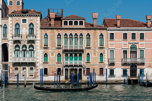 Venice, Italy, April 1st, 2019 Canale Grande waterfront with gondola and residential houses © alexander h. schulz
