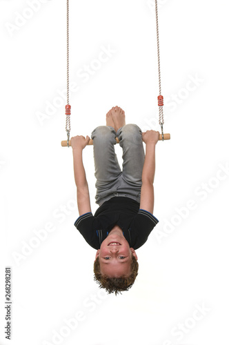 child playing with a swing on a white background