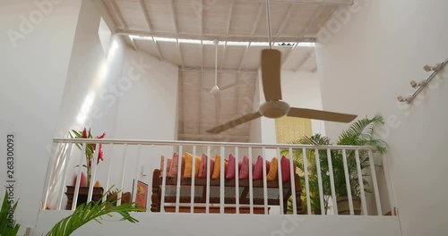 Modern ceiling fan in the living room. tracking shot. in slow motion. Shot on Canon 1DX mark2 4K camera