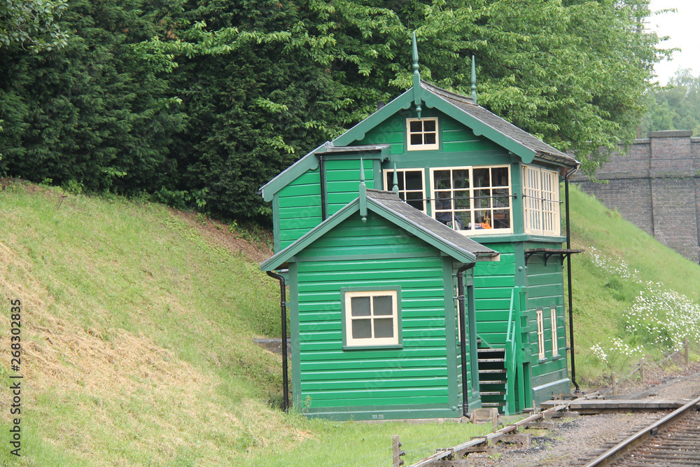A Traditional Green Wooden Railway Signal Box. A Traditional Green Wooden Railway Signal Box.