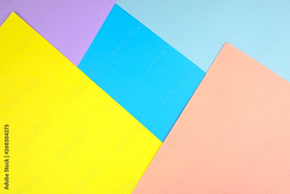 Abstract color background. Paper blanks on a table. Office minimalism style concept. Empty space for design and text. 