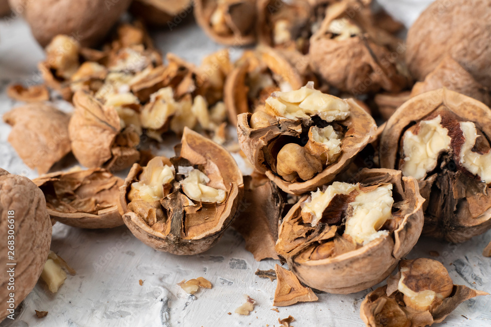 walnuts with a cracked or opened shell, vegetarian breakfast cookings walnuts with a cracked or opened shell, vegetarian breakfast cookings