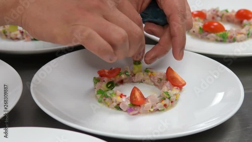 Wallpaper Mural Extreme close up of chef putting final ingredients on exquisite entree Torontodigital.ca