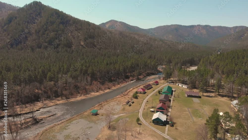 Aerial view of camping houses, in Altai mountains, cinematic drone footage Aerial view of camping houses, in Altai mountains, cinematic drone footage