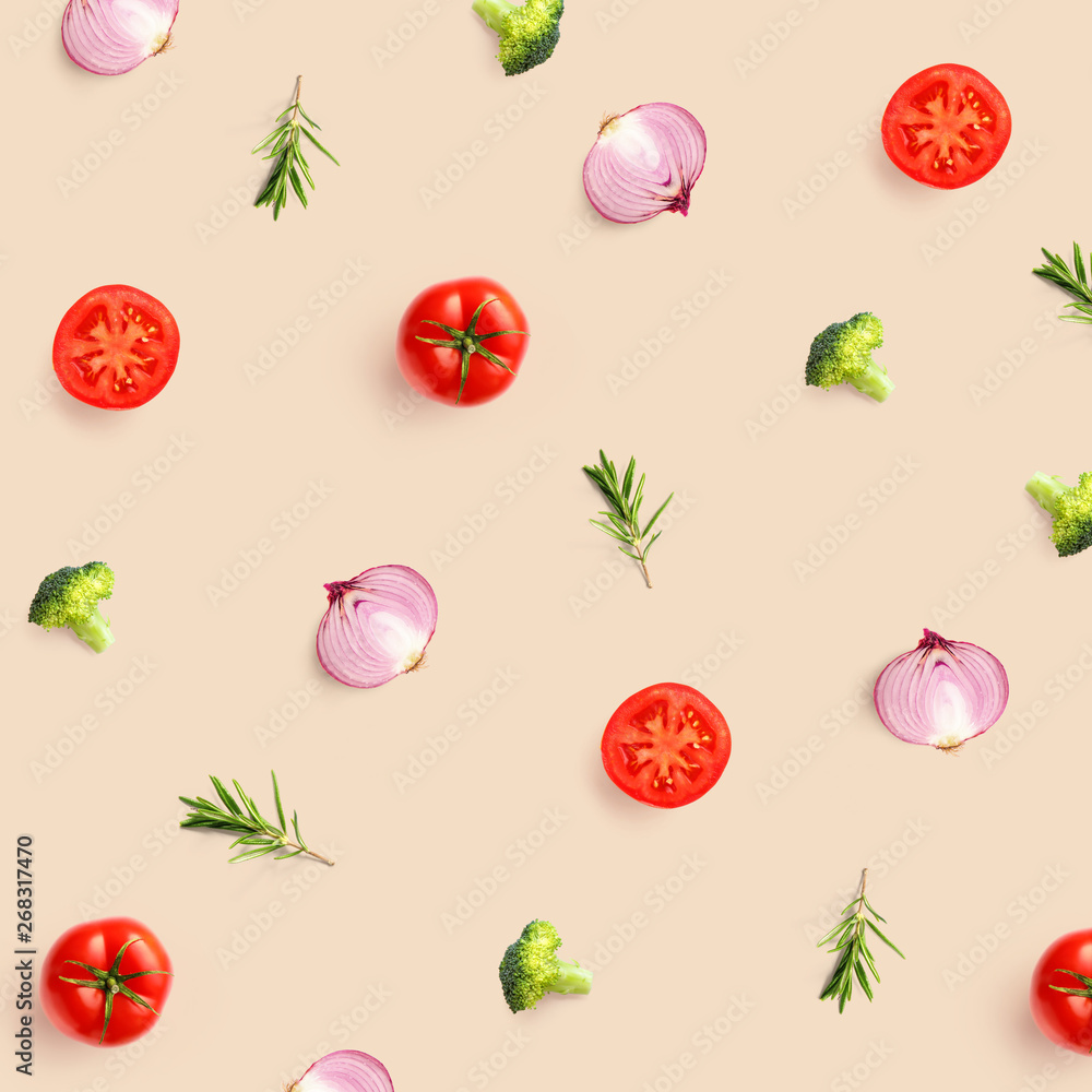 Creative pattern made of tomato, broccoli and onion on beige background. Flat lay. Food concept. Creative pattern made of tomato, broccoli and onion on beige background. Flat lay. Food concept.