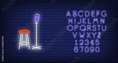 Stage neon icon. Mic and chair on brick wall background. Show concept. Vector illustration can be used for neon signs, advertising, stand up show, music contest