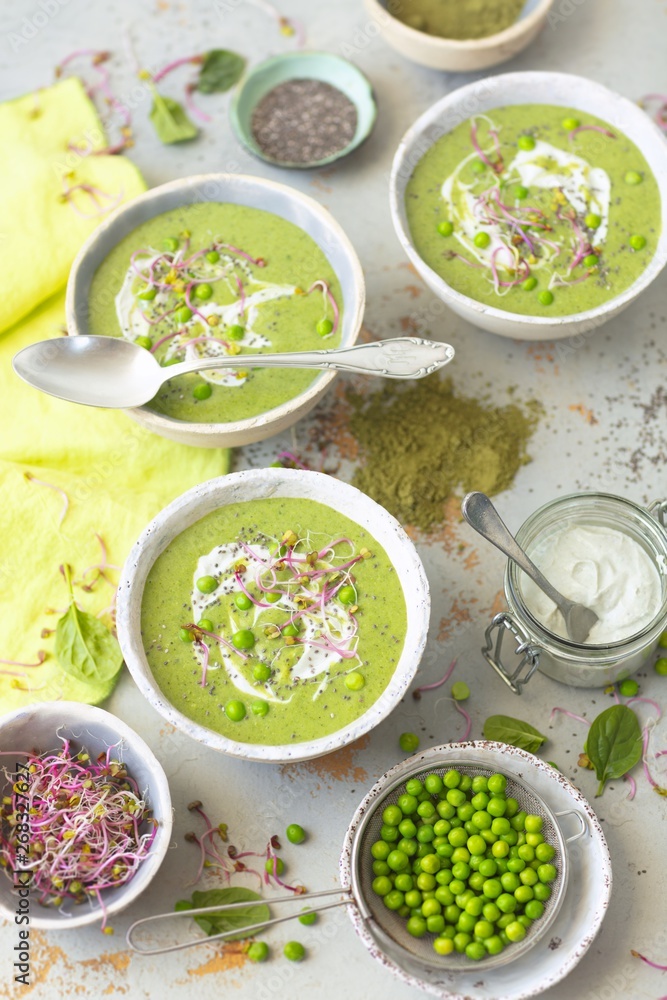 Green cream soup made with zucchini, potatoes, spinach and green peas Green cream soup made with zucchini, potatoes, spinach and green peas