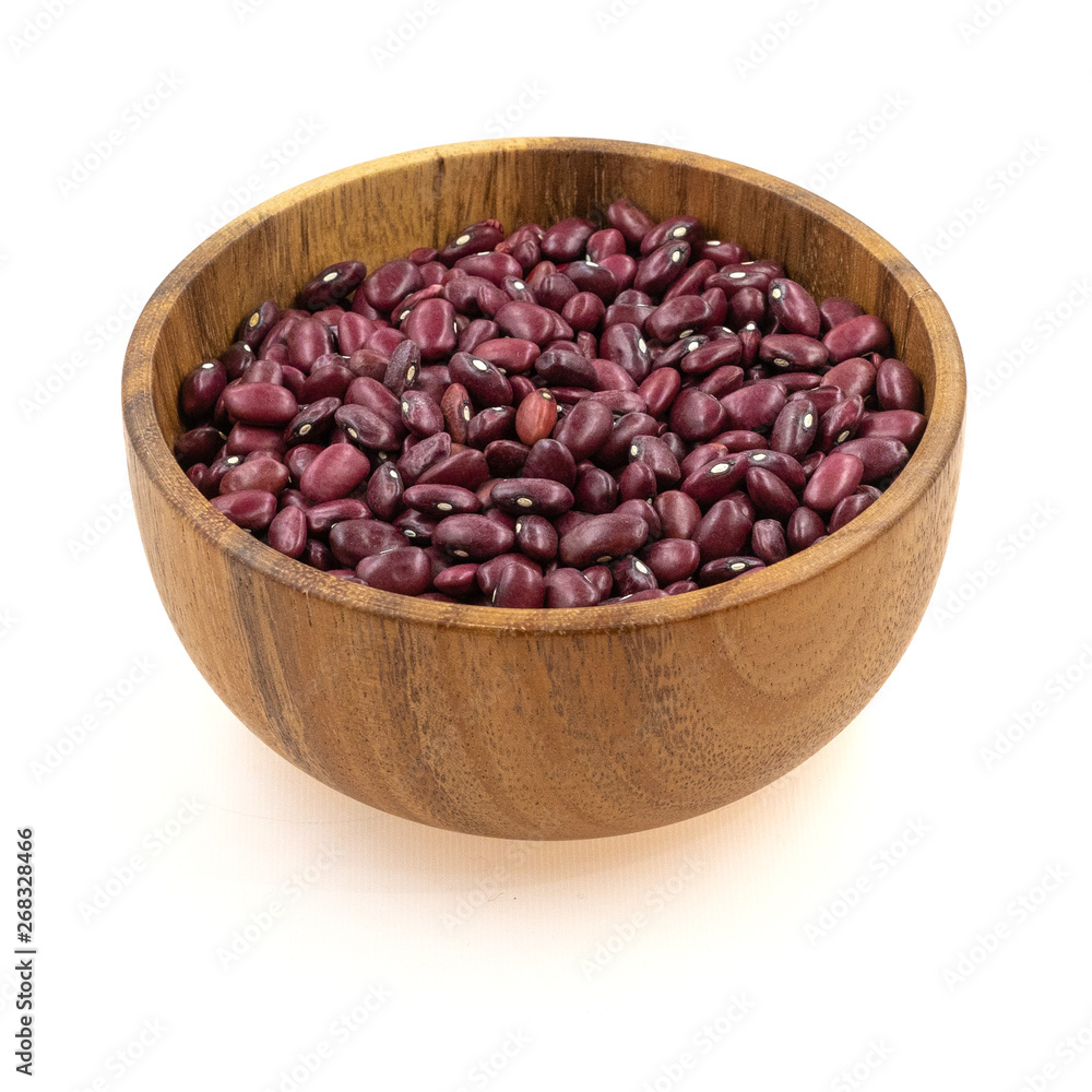 Red beans in a wooden dishes isolated on white background Red beans in a wooden dishes isolated on white background