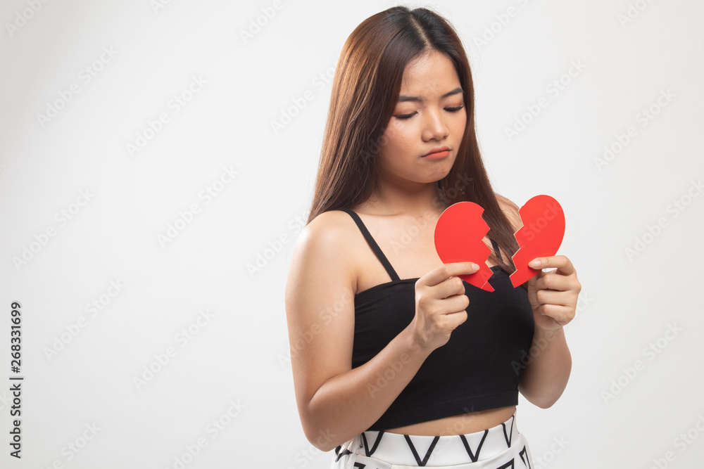 Beautiful young Asian woman with broken heart. Beautiful young Asian woman with broken heart.