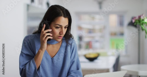 4K Businesswoman making a phone call, getting put on hold & getting fed up. Slow motion.