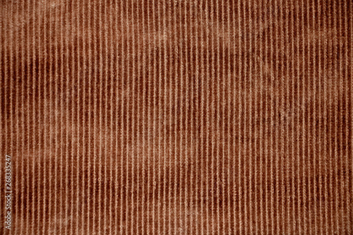 Texture retro, red brown corduroy fabric. photo