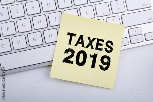 Taxes 2019 Concept On Sticky Note photo