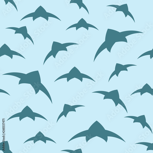 A flock of birds in the sky. Seamless pattern. Vector background EPS10