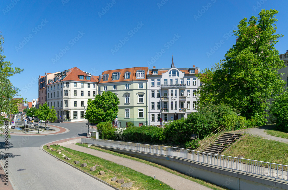 street and houses in the city of rostock - sunny day