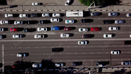 Drone's Eye View - Aerial top down view of road cars and trucks photo