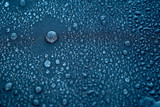 water drops on the fabric surface macro photo