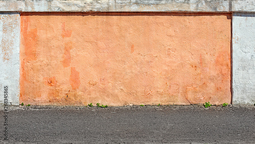 Grunge aged texture street urban background Old concrete wall orange saver model shooting