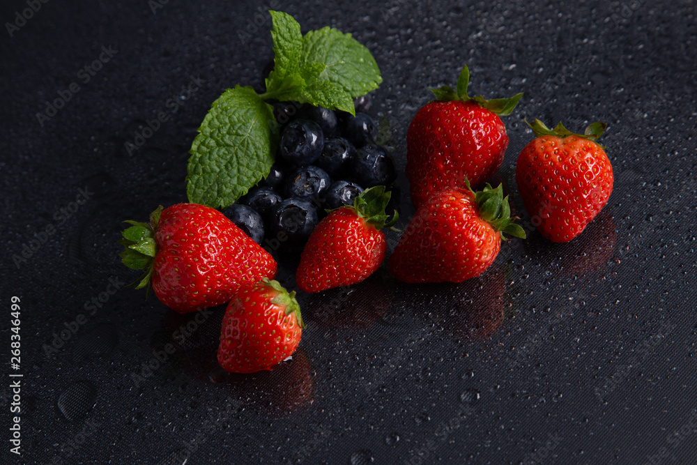 Fruits on black background smoothie ware Fruits on black background smoothie ware