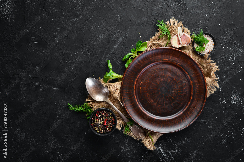 Preparing for cooking. Spices, vegetables, kitchen board. Top view. Free space for your text. Rustic style.