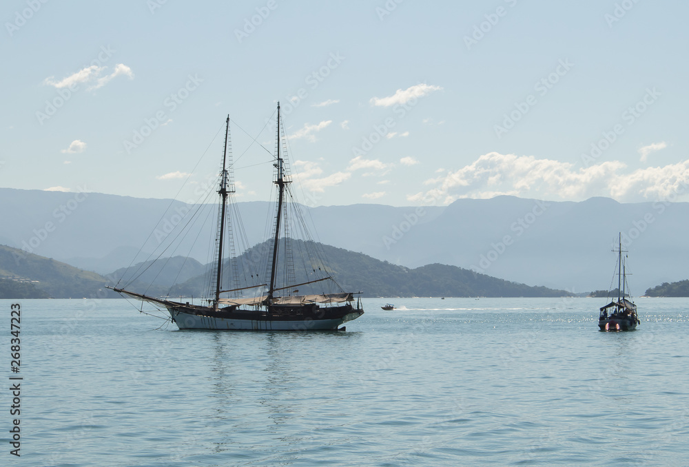 Boats sailing in the sea. Beautiful blue sea. Boats sailing in the sea. Beautiful blue sea.