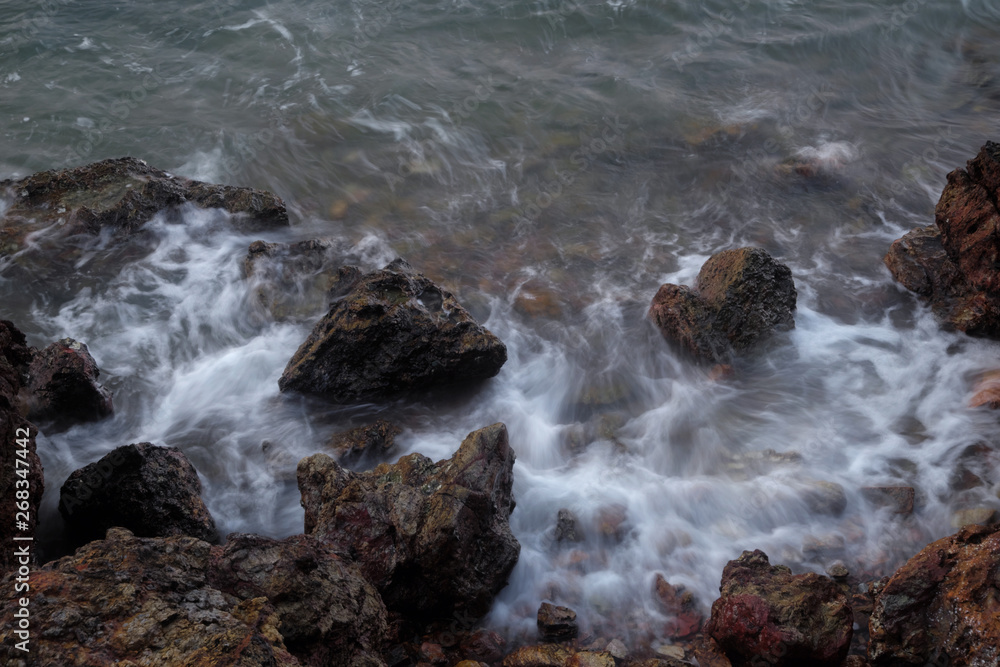 long exposure rocks and waves background