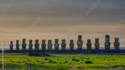 Sunrise clouds behind Moai statues of Ahu Tongariki on Easter Island