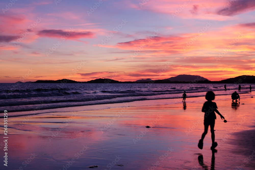 summer beach with dramatic sunset sky background