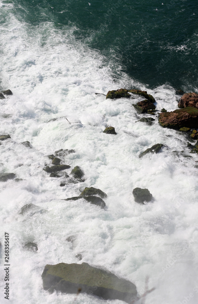 rocks in water at Niagara Falls rocks in water at Niagara Falls