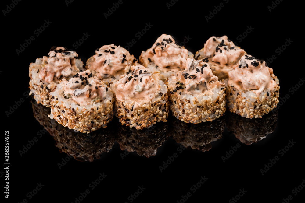 Sushi Roll - Maki Sushi pieces collection with Salmon Roe, Smoked Eel, Cucumber, Cream Cheese, Sesame, Avocado, Onion Fries, Crab Meat, Tobiko isolated on black background - Image Sushi Roll - Maki Sushi pieces collection with Salmon Roe, Smoked Eel, Cucumber, Cream Cheese, Sesame, Avocado, Onion Fries, Crab Meat, Tobiko isolated on black background - Image