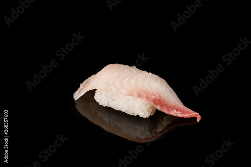 Sushi Roll - Maki Sushi pieces collection with Salmon Roe, Smoked Eel, Cucumber, Cream Cheese, Sesame, Avocado, Onion Fries, Crab Meat, Tobiko isolated on black background - Image