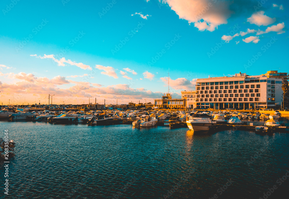 evening picture of port at portugal with some motor- and sailingboats