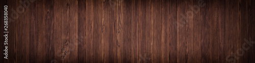 Dark texture wall of brown plank  background wooden surface   panoramic view