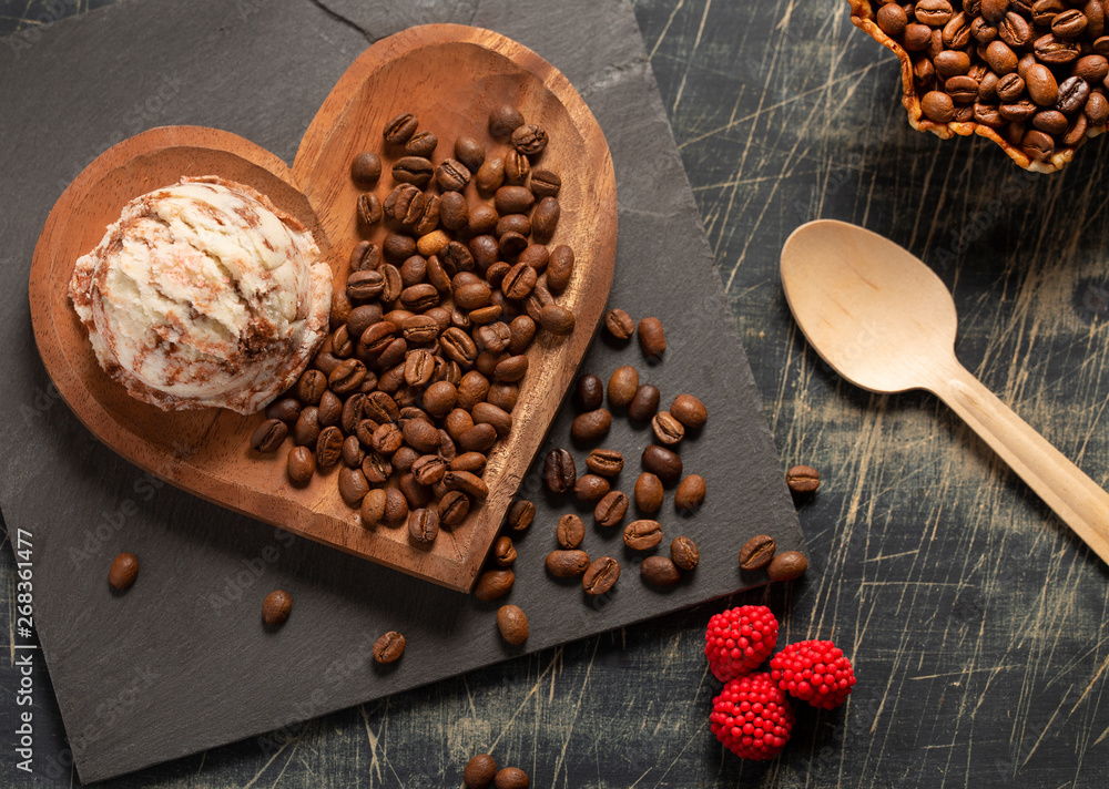Top view brown ice cream and coffee beans on old rustic vintage. Coffea Top view brown ice cream and coffee beans on old rustic vintage. Coffea