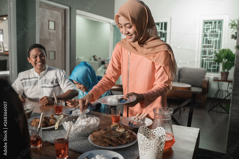 Happiness of friendship when enjoy eating iftar together in the afternoon Happiness of friendship when enjoy eating iftar together in the afternoon