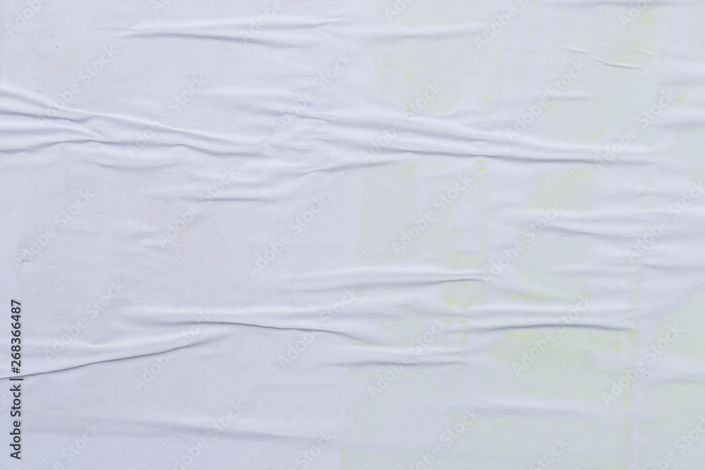 Obraz premium White creased poster texture. Abstract background.