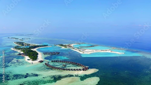 Aerial view,  flight at island Olhuveli with Waterbungalows, South Male Atoll, Maldives photo