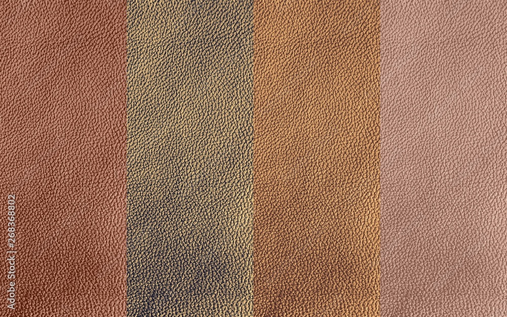 Fototapeta premium The texture of genuine leather. Impeccable and stylish background. Beautiful stylish background. Natural skin texture close up. Brown background. The structure of the leather material brown shades.
