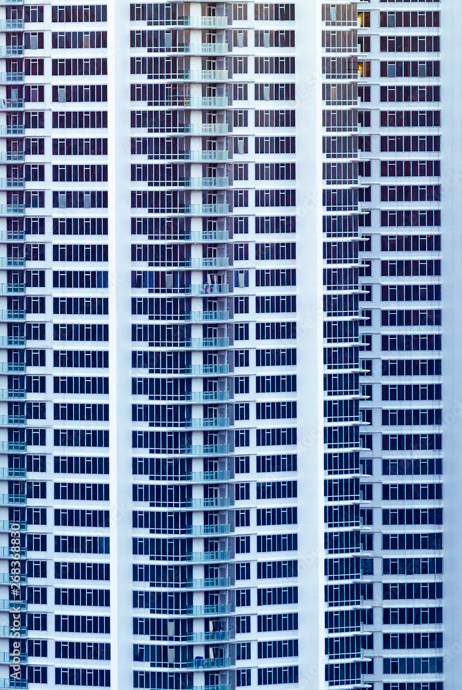 Highrise enormous condo building facade in white. Ultra modern. Highrise enormous condo building facade in white. Ultra modern.