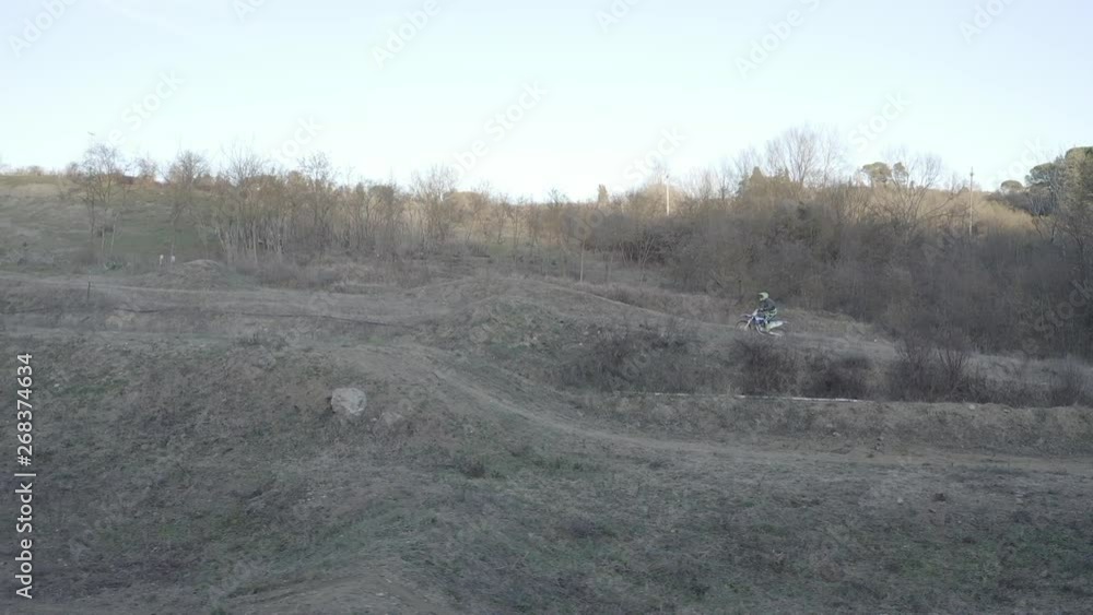 Motocross rider on a dirt track Motocross rider on a dirt track