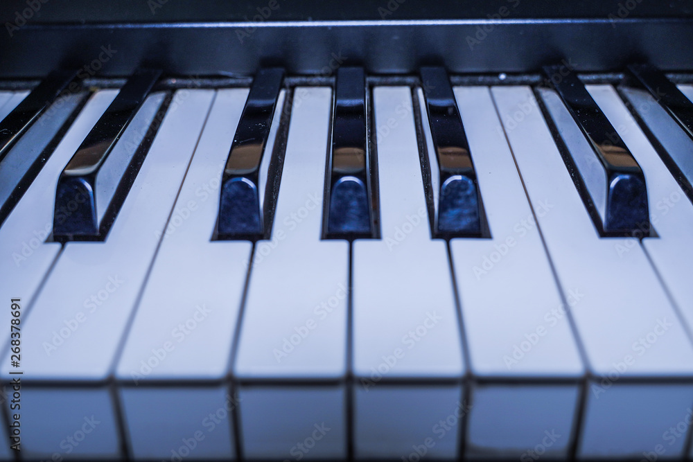 Piano keys side view. Piano keyboard background. Piano keys side view. Piano keyboard background.