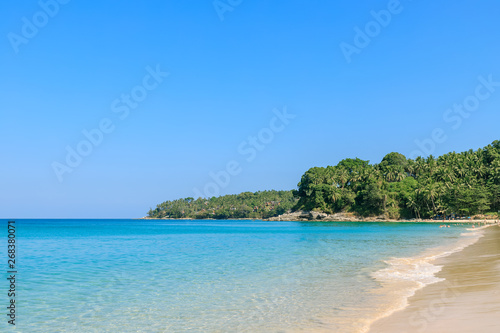 Crystal clear turquoise blue Andaman sea at Surin Beach, Phuket, Thailand