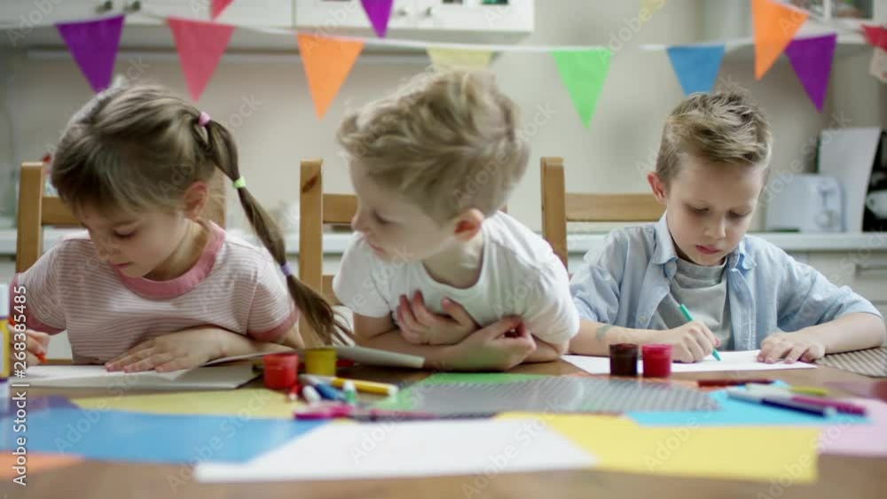 children do craft things with scissors and pens with flow camera and focus on them children do craft things with scissors and pens with flow camera and focus on them