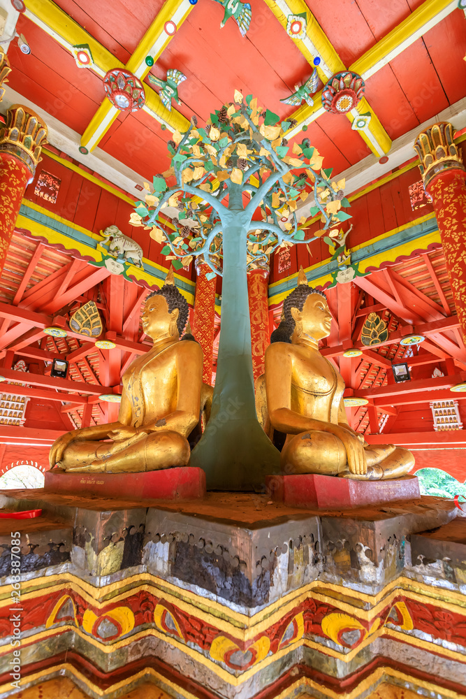 Lampang, Thailand - December 28, 2018: Four Buddha sculpures in pavilion at Wat Pong Sanuk temple and museum in Lampang, North of Thailand