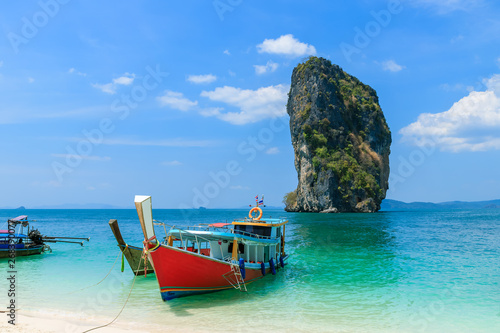 Beautiful crystal clear turquoise blue sea and boats at Ko Poda Island, Ao Phra Nang bay, Krabi, Thailand