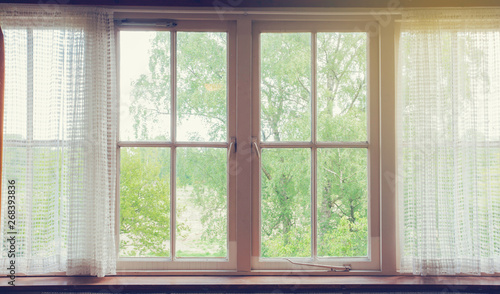 Window with curtains and green nature view   vintage design