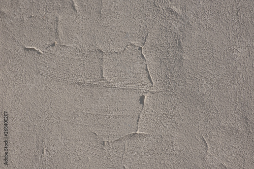 Texture of a cracked plaster wall photo