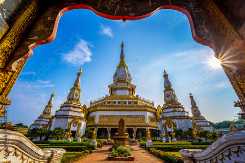 Chai Mongkol Chedi Pagoda in Wat Pha Nam Thip Prasit Wanaram, Landmark at Roi Et Province, Thailand. photo